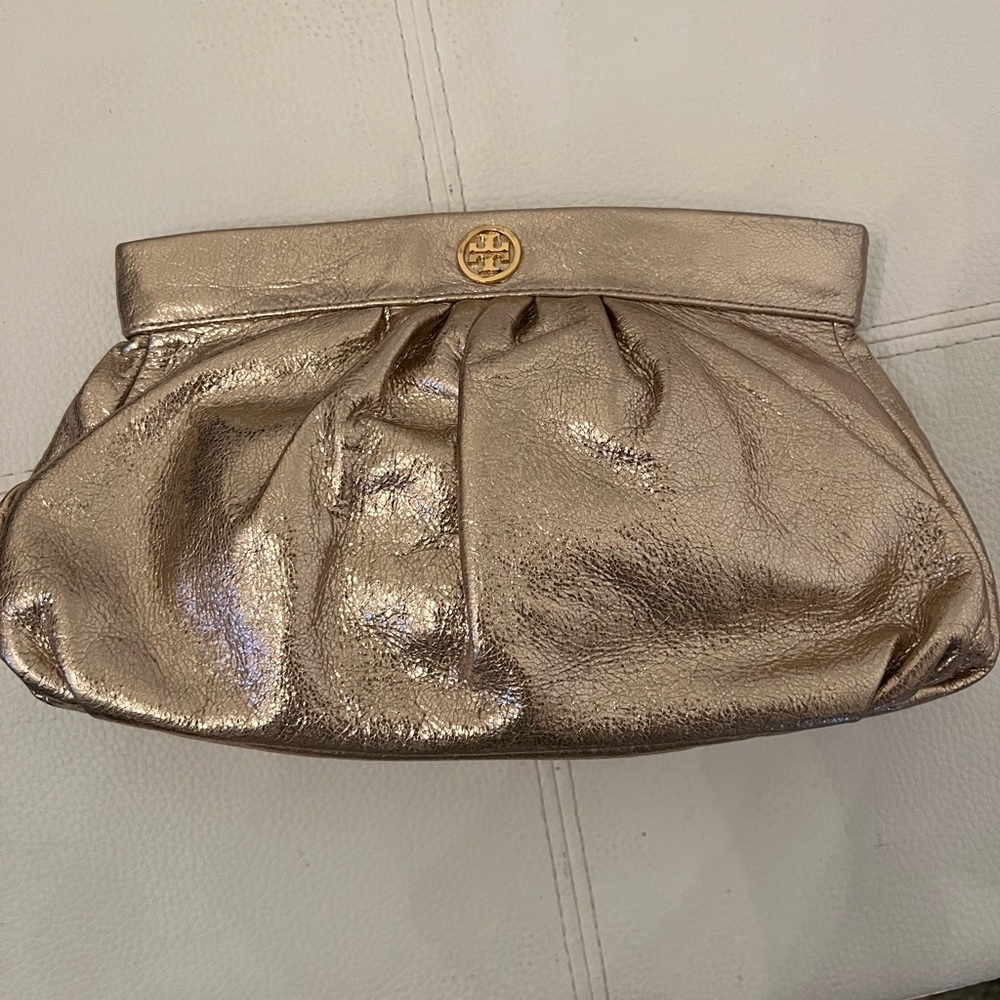 TORY BURCH gold clutch w/slight rose gold undertone. Elegant, classy. NEVER USED